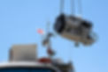 boat engine being removed.jpg