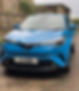 car with blue wrap