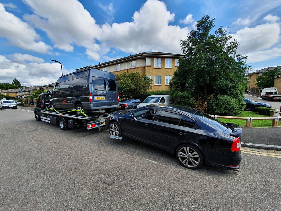 van and car being recovered