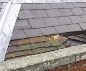 tiles falling off a roof