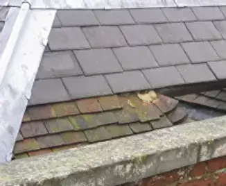 tiles falling off a roof