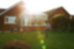 child playing in front of conservatory.jpg