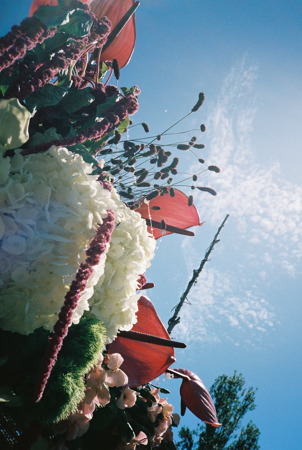 Colourful wedding flowers arranged with a soft, romantic feel.