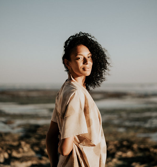 woman warmly looking at camera