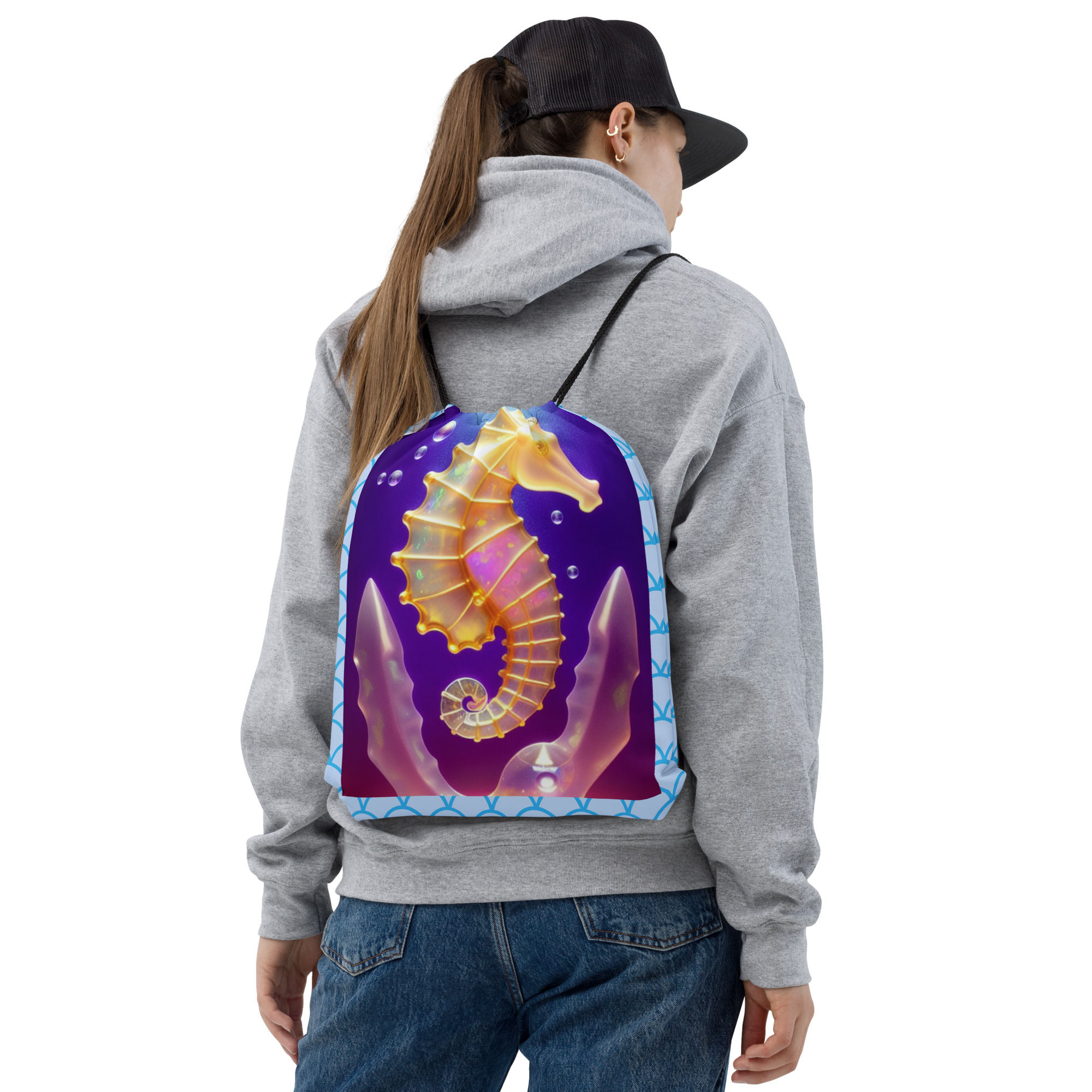 SEahorse swimming through the vibrant colored waters.