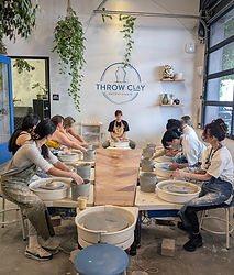 A course in session on the potter's wheel at Throw Clay LA.