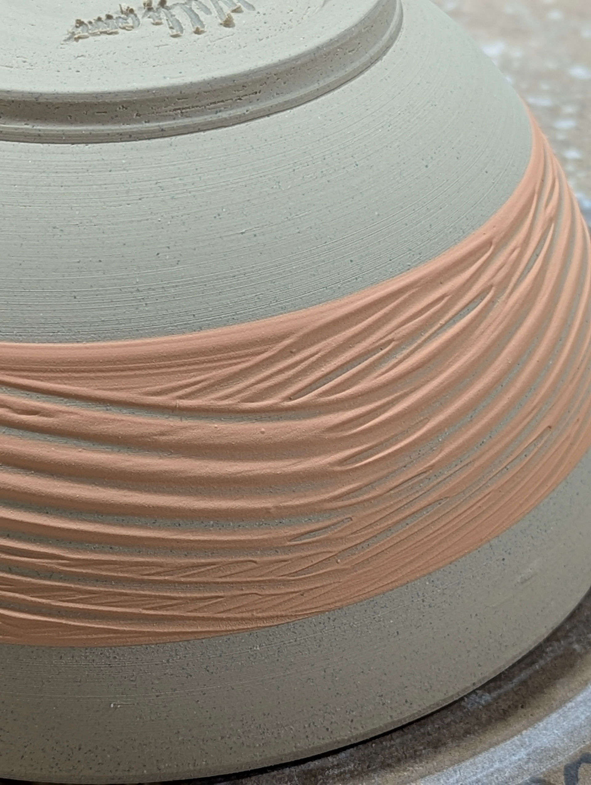 A slip glazed border on a bowl.