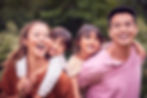 portrait-of-smiling-asian-family-outdoors-with-par-2023-11-27-05-08-56-utc.jpg
