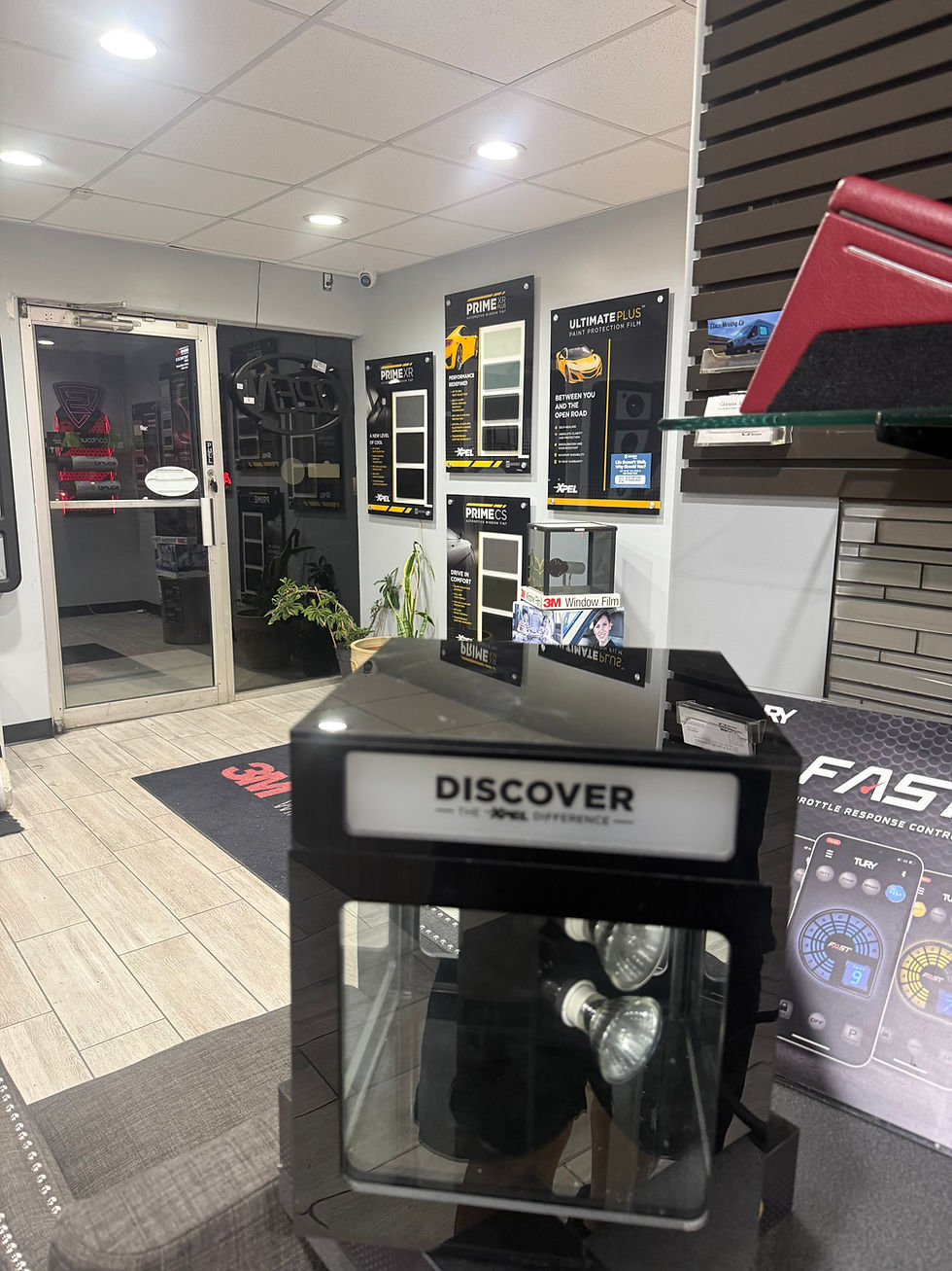 3M and XPEL tint comparison showroom with heat box demo at Sunshades Austin