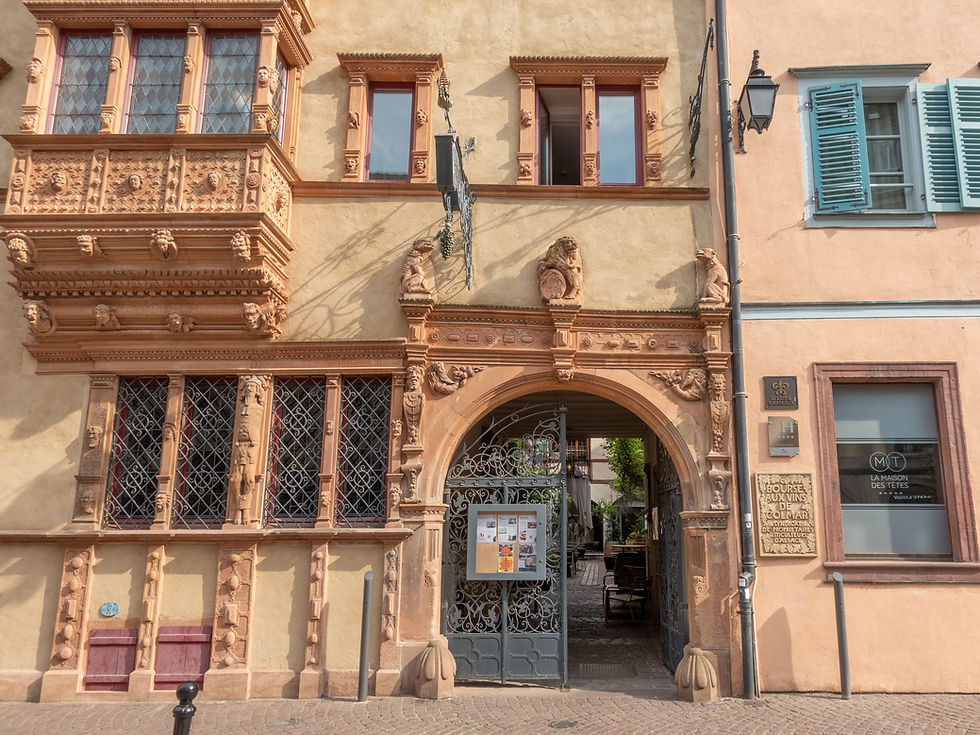 Decorated projecting oriel window of Maison des Têtes in Colmar