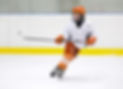 young_hockey_player_orange_edit.jpg