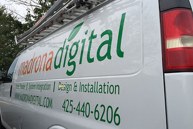 Madrona Digital van with contact information on the side