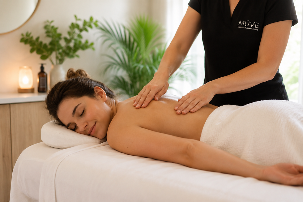 Registered Massage Therapist providing a relaxing massage at MÜVE Massage Therapy Studio in Kitchener, helping reduce stress and support nervous system health.