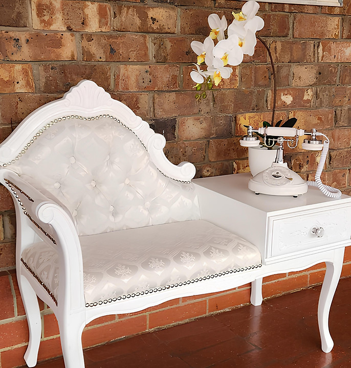 White retro Houston vintage audio guestbook phone displayed on a restored antique telephone table at a South Australian wedding.