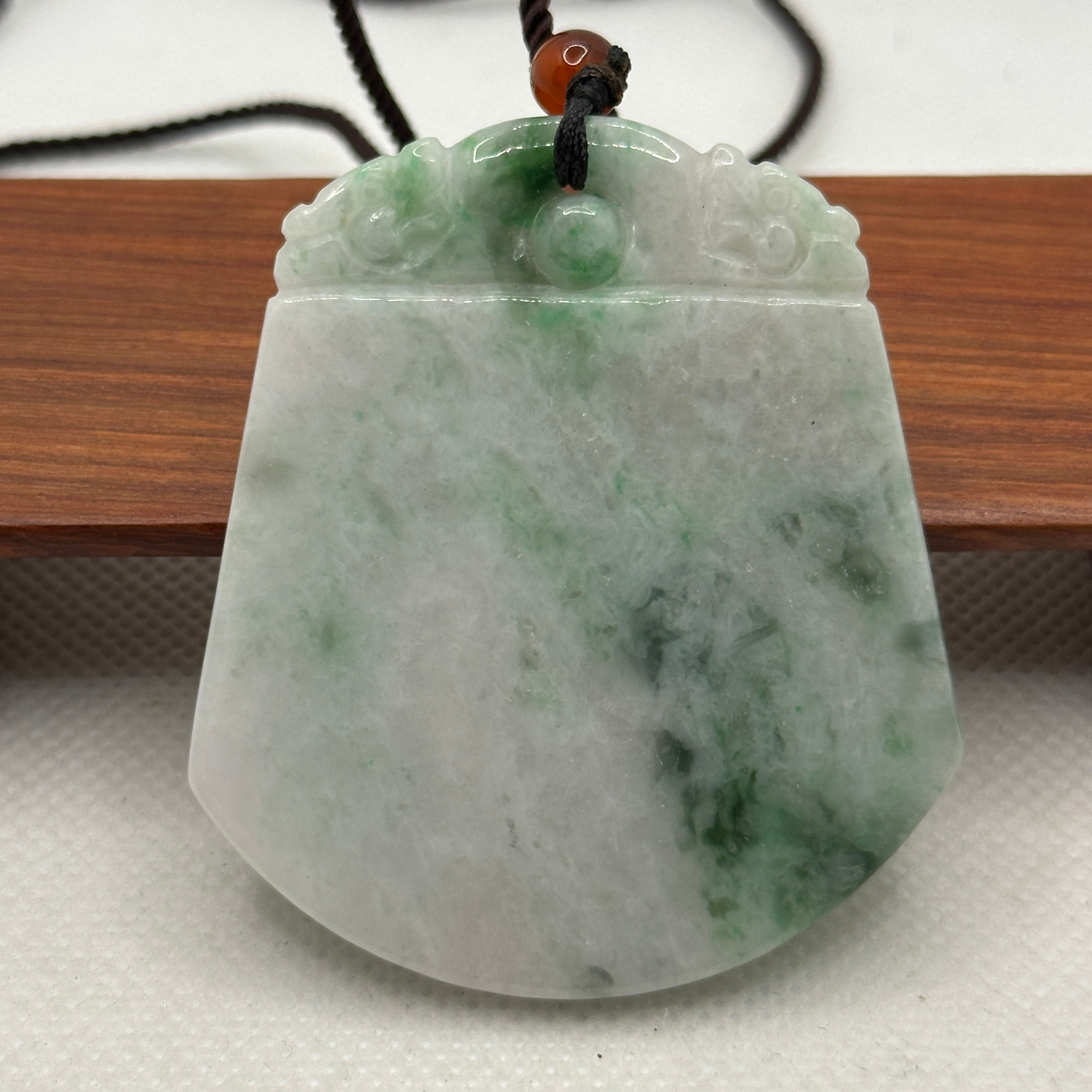 【開太平】：古紋青玉斧無事牌