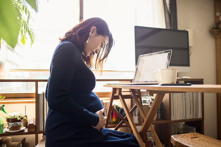 Pregnant Woman Working