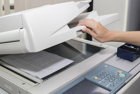 1200-511879530-woman-opening-photocopier.jpg
