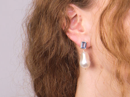     Long pearl earrings by Domnita, designed for a refined and timeless look.