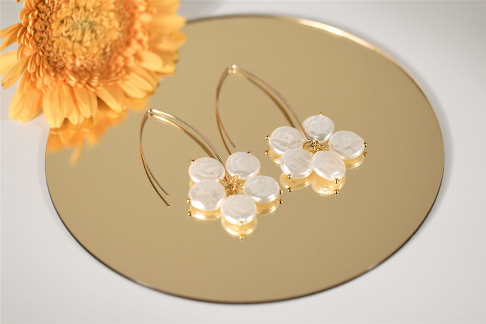 Close-up view of elegant gold earrings