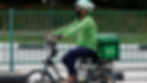 GrabFood delivery rider on an e-bike