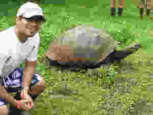 Sachin Shah hanging out with a tortoise.