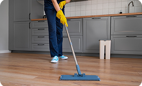 front-view-woman-cleaning-home.png