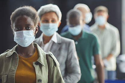 Woman-in-mask-standing-in-a-queue-1278641086_1258x838.jpeg