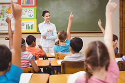 Teacher-asking-a-question-to-her-class