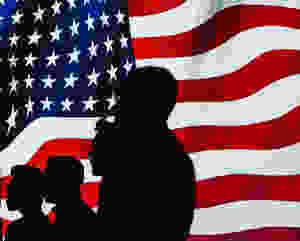 People silhouetted against American Flag Photo by Brett Sayles from Pexels