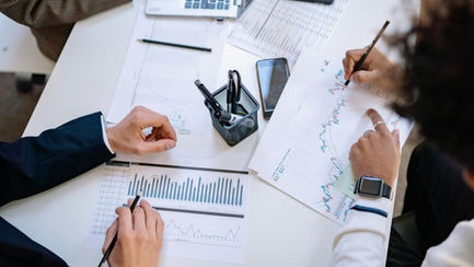 people reviewing business metrics
