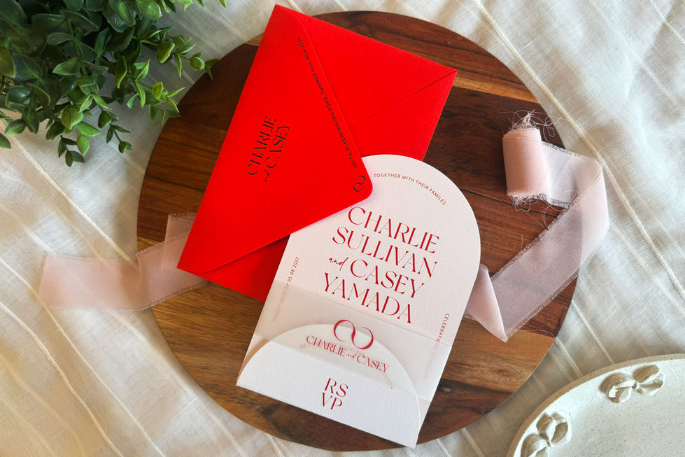 Modern layered wedding invitation set in blush and off-white with guest name tag