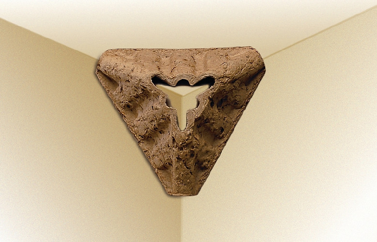A cut away image of a corner guard showing unique no edge or corner contact design of Western packaging materials.