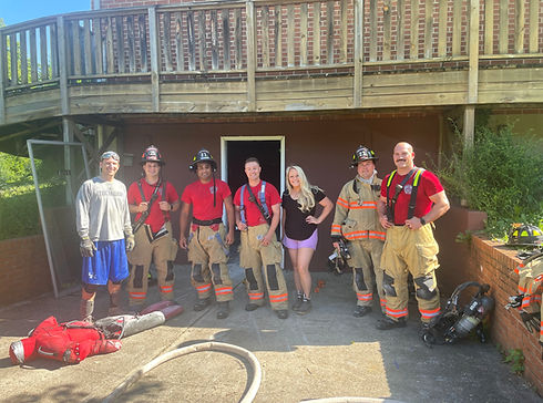 LOX Beauty Collective owners with ClearCreek Fire Department during building renovation Springboro Ohio