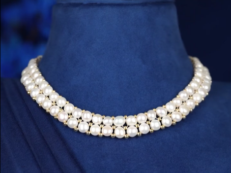 Elevate your look with our button-shaped pearl set, accented with golden beads