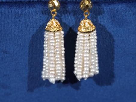 Adorn yourself with our pearl bunch earrings, perfect for any occasion