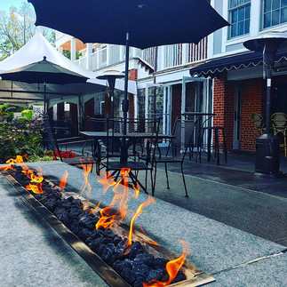 Fireplace at Farmer's Creekside Tavern and Inn outdoor bar