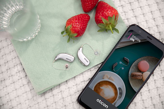 Oticon More and CellPhone.jpg
