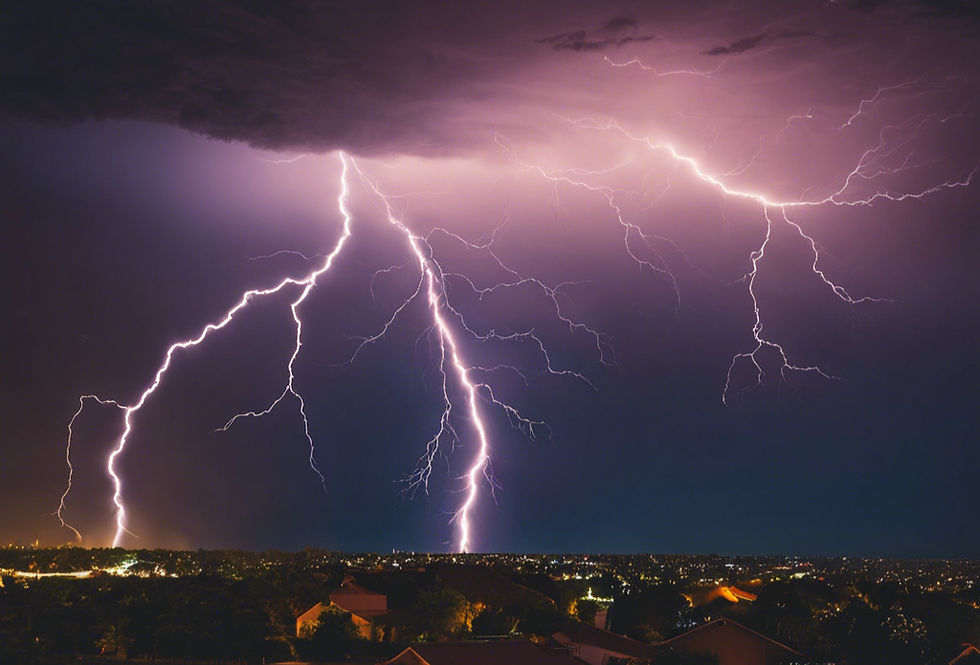 Photo depicts a strong lighting strike illuminating the night sky over southern Miami.