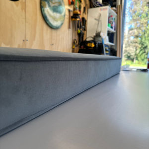 Handcrafted velvet piped squab cushion by D4 Upholstery, specialist upholstery services in Auckland.