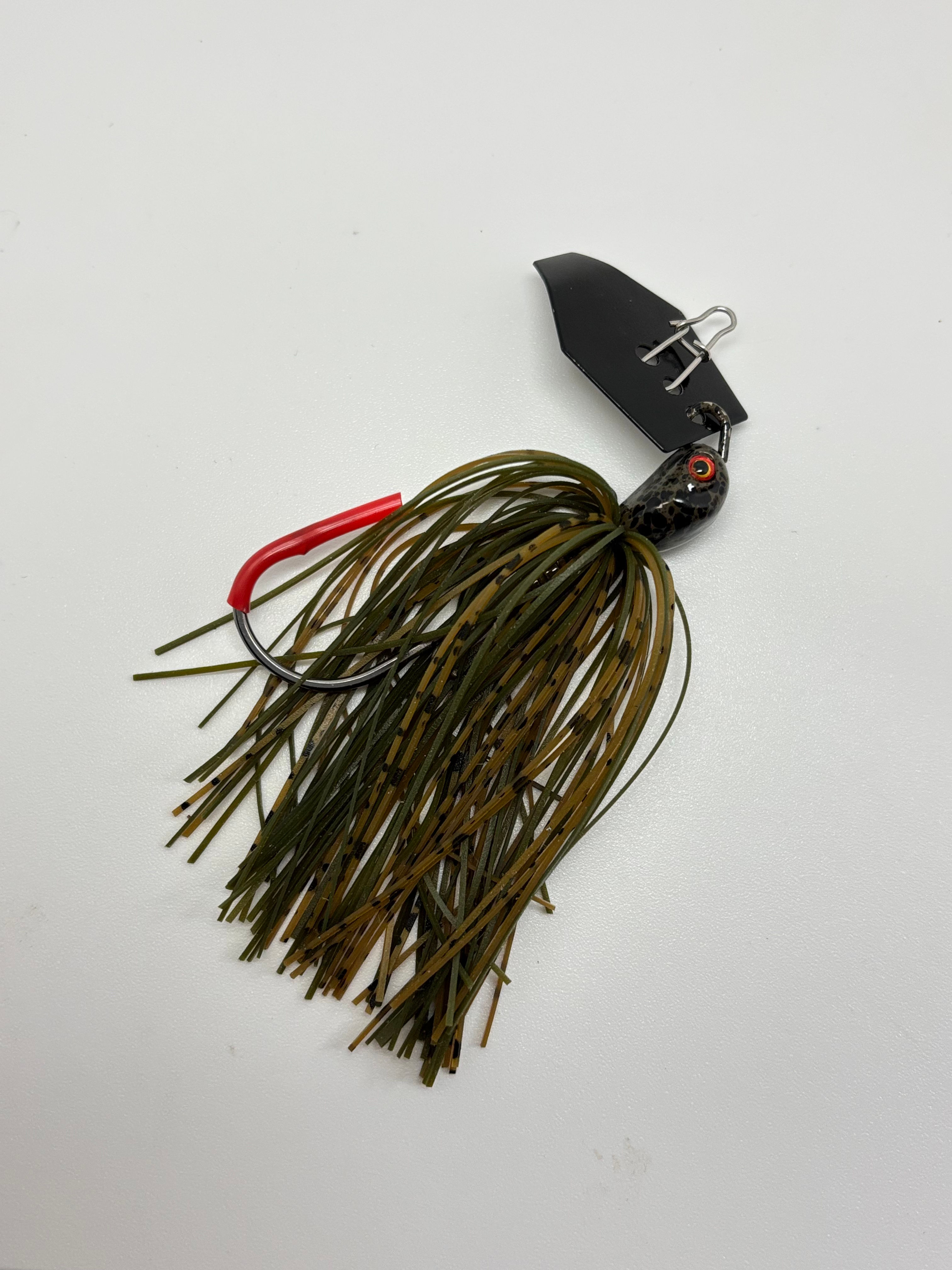 Defense Bait and Tackle Navy Squid Bladed Jig 1/2 oz- Green Pumpkin/ black  