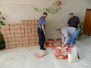 Distributing 452 Food Baskets to the Displaced Families