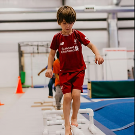 If your child is under 5, please check out our Mini Moxie classes upstairs in the gymnastics section.
For boys ages 5-10, our Green Gym offers structured classes downstairs with equipment just for them. Boys ages 10 and up move to the Blue Gym, which features advanced gymnastics apparatus. Both programs focus on skill development, building strength, and boosting confidence in a supportive and fun environment.