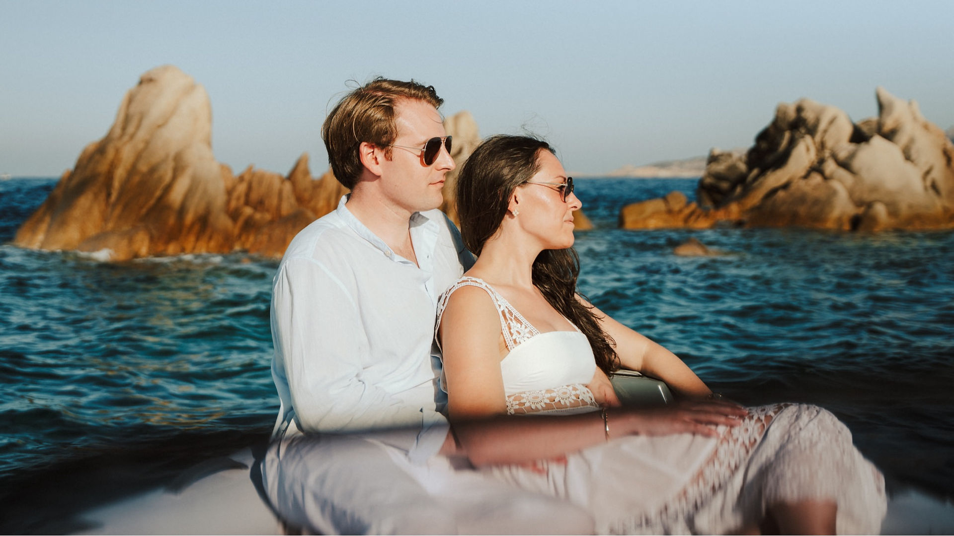 Isola Maddalena Sardinia engagement couple boat Photographer Cala Spalmatore
