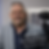 Australian historical fiction author Paul Rushworth-Brown posing beside a camera during a media interview.