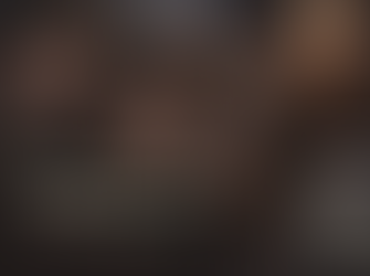 A rugged father, teenage son, and young woman stand close together in a cold, rain-soaked wartime setting, their faces tense and weathered. The text “A Father’s Love For His Son” overlays the image, with the book Red Winter Journey by Paul Rushworth-Brown shown on the right.