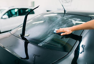specialist-prepairs-window-car-tinting-film-male-installation-process-installing-procedure