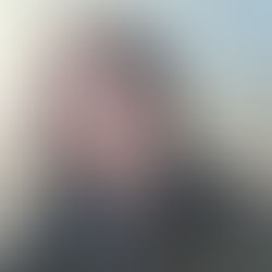 Image of a woman and a lake 