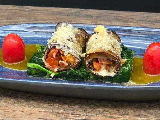Auberginenroulade auf Spinat mit Orangenbutter