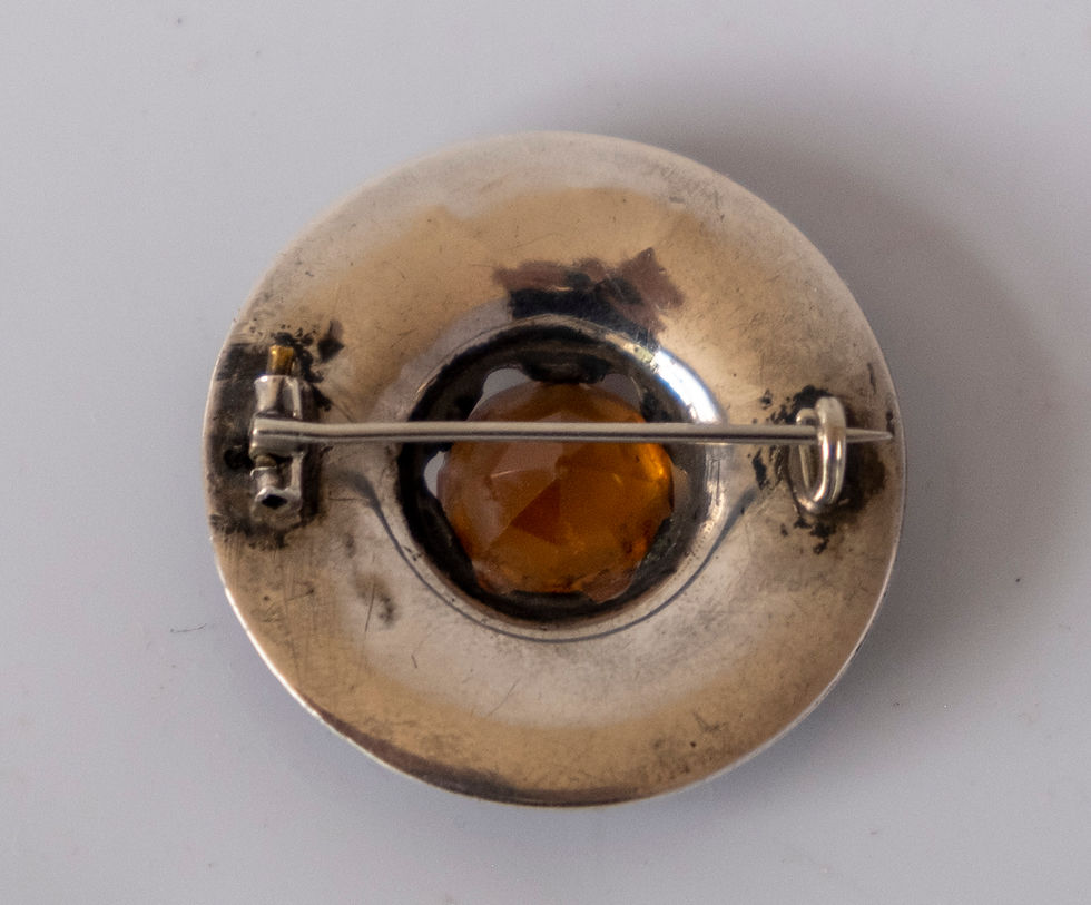 Thumbnail: A Victorian Scottish hardstone and citrine silver set shield brooch