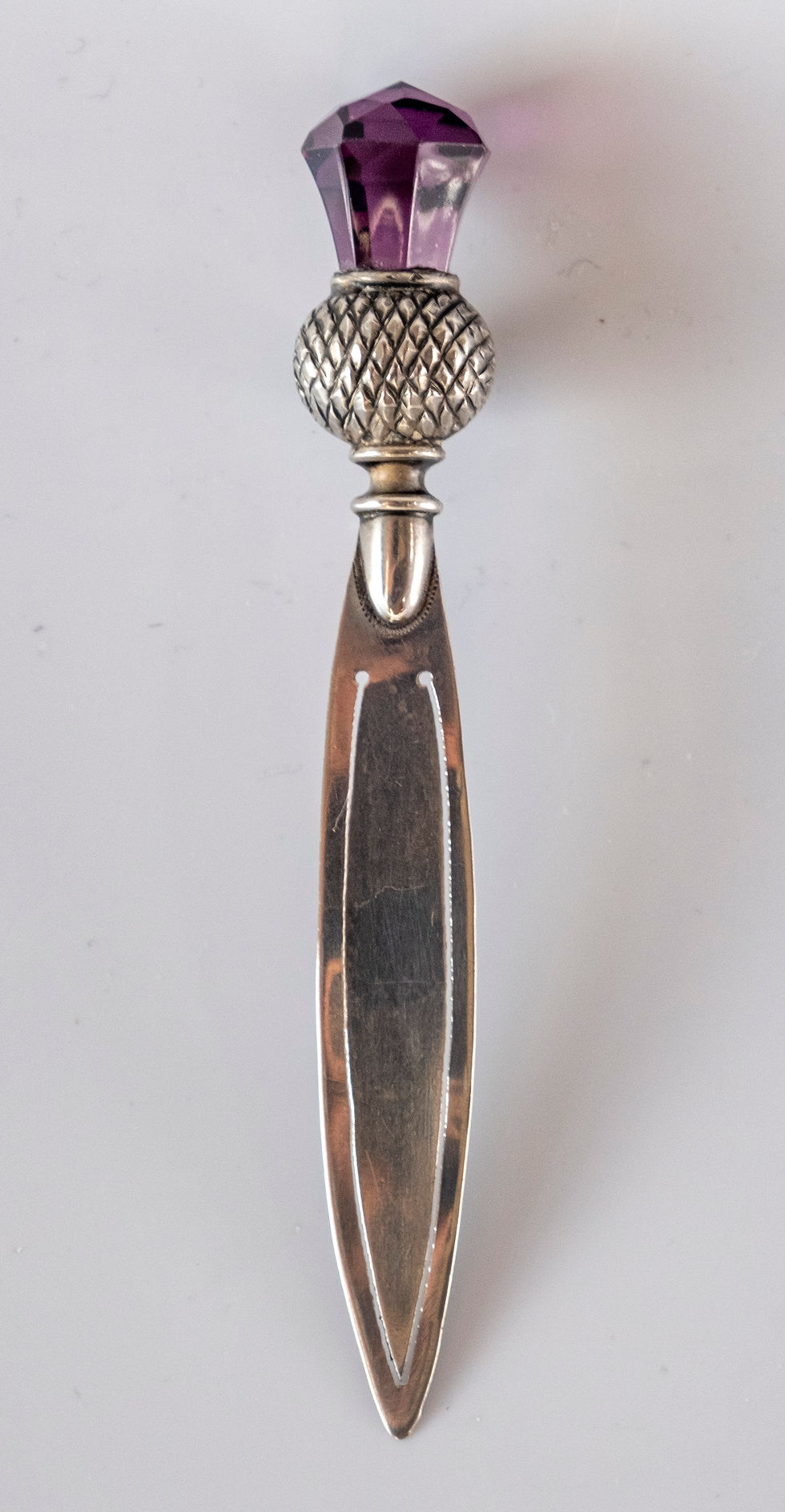 A silver and amethyst paste stone thistle Bookmark
